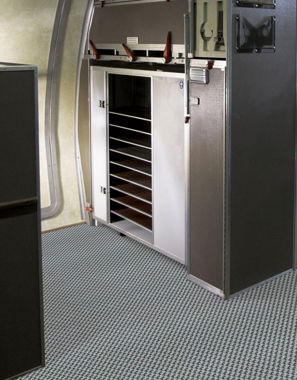Kitchen/Storage area of the plane with non-textile flooring